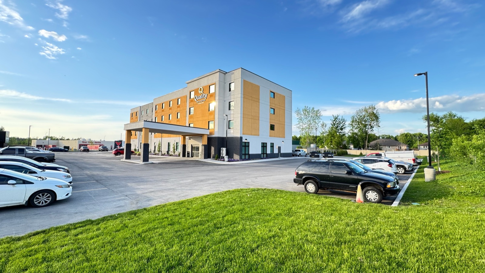 Completed four-storey Quality Inn hotel in Prescott, Ontario, a commercial drywall project by True Drywall Contracting
