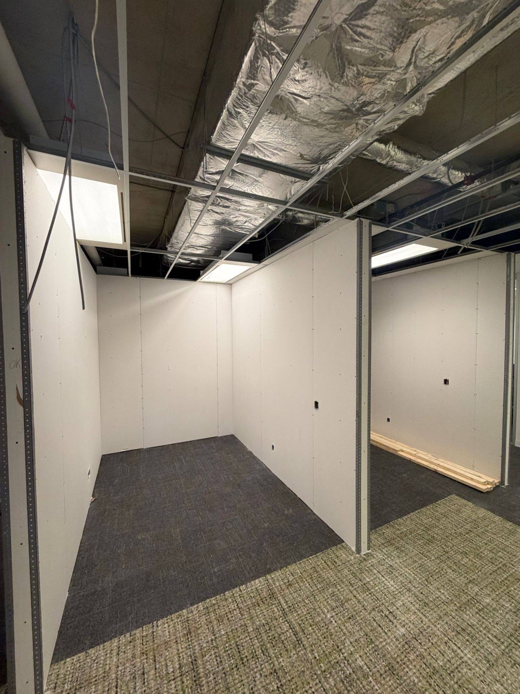 Office partitions framed under the existing T-bar grid in Woodbridge